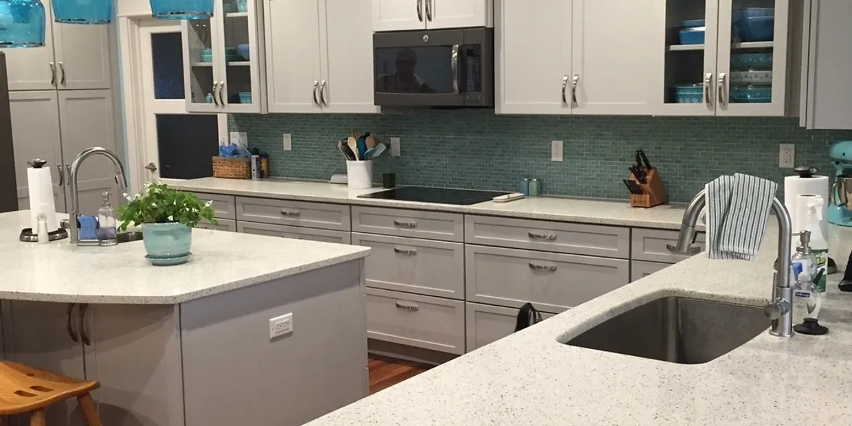 Spacious kitchen featuring island and sink
