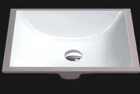 Modern white bathroom sink with drain.