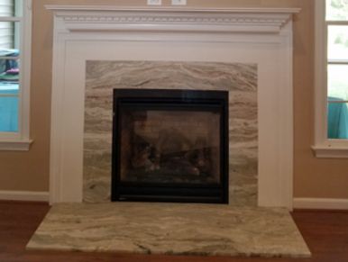 Marble fireplace with white mantel