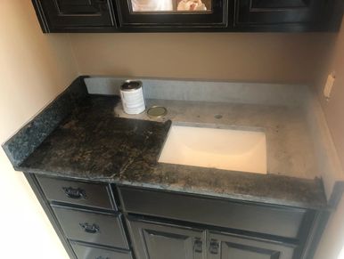 Modern dark bathroom vanity setup