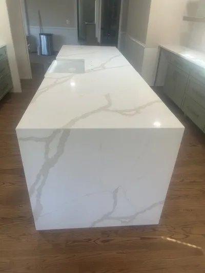 Modern kitchen island with marble finish